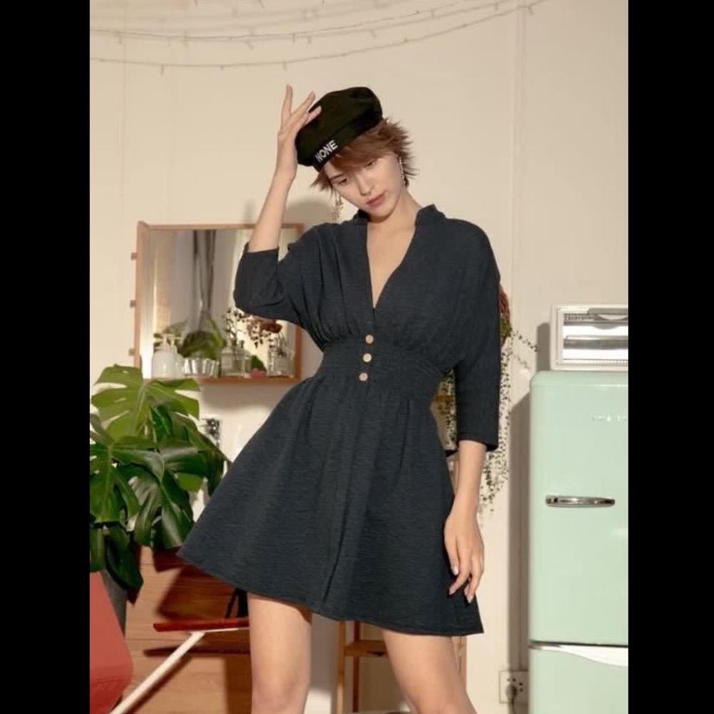 Designer’s v-neck dress